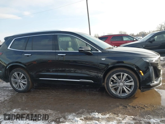 2025 Cadillac XT6 FWD Premium Luxury with VIN 1GYKPCRS6SZ104902, listed as a IAAI auction lot 41565224 with 4,735 mi miles and . Bid and sale history available at DreamBid. Image 13.