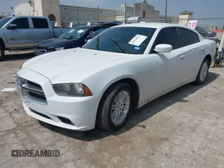 2013 Dodge Charger SXT with VIN 2C3CDXHG0DH664865, listed as a IAAI auction lot 41914053 with 195,211 mi miles. Bid and sale history available at carsss.com. Image 2.