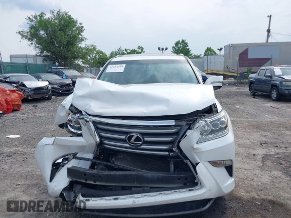 2015 Lexus GX 460 with VIN JTJBM7FX8F5119367, listed as a IAAI auction lot 42453473 with 142,000 mi miles and . Bid and sale history available at DreamBid. Image 13.