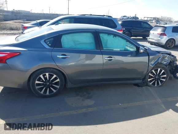 2018 Nissan Altima SR with VIN 1N4AL3AP5JC243138, listed as a IAAI auction lot 41750643 with 123,601 mi miles and . Bid and sale history available at carsss.com. Image 13.