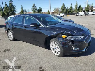 2020 Ford Fusion Plug-In Hybrid Titanium with VIN 3FA6P0SUXLR113325, listed as a Copart auction lot 81415324 with 51,893 mi miles and Salvage Title. Bid and sale history available at carsss.com. Image 4.