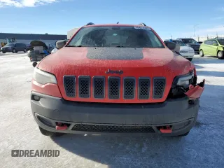 2019 Jeep Cherokee Trailhawk with VIN 1C4PJMBX7KD361816, listed as a Copart auction lot 46457465 with 244,301 mi miles and Salvage Title. Bid and sale history available at DreamBid. Image 5.