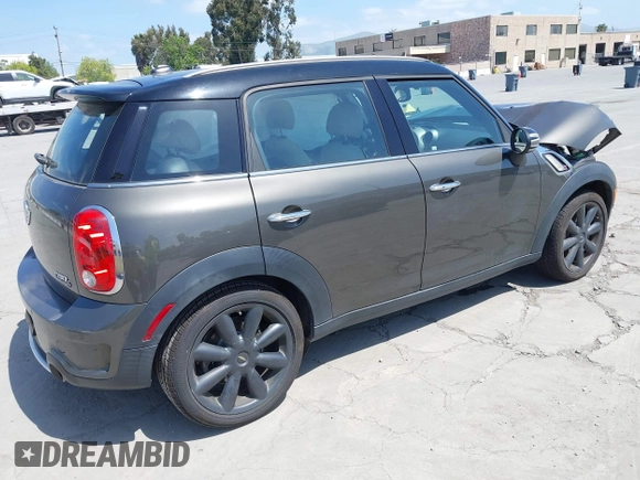 2012 MINI Countryman S with VIN WMWZC3C53CWL83664, listed as a IAAI auction lot 42062673 with 102,615 mi miles and . Bid and sale history available at DreamBid. Image 4.