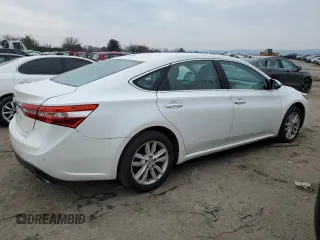 2015 Toyota Avalon Limited with VIN 4T1BK1EB2FU151048, listed as a Copart auction lot 72713602 with 73,435 mi miles and . Bid and sale history available at DreamBid. Image 3.