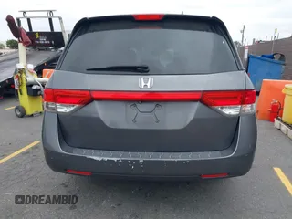 2014 Honda Odyssey Touring with VIN 5FNRL5H97EB114634, listed as a IAAI auction lot 42105220 with Not Provided miles and . Bid and sale history available at carsss.com. Image 15.
