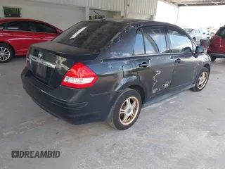 2009 Nissan Versa 1.8 S with VIN 3N1BC11E79L368680, listed as a IAAI auction lot 42090230 with 190,049 mi miles. Bid and sale history available at carsss.com. Image 4.
