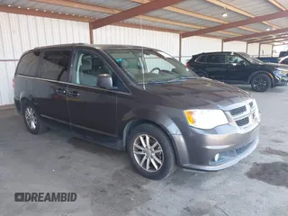 2018 Dodge Grand Caravan SXT with VIN 2C4RDGCG5JR209514, listed as a IAAI auction lot 42057040 with 128,858 mi miles and . Bid and sale history available at DreamBid. Image 1.