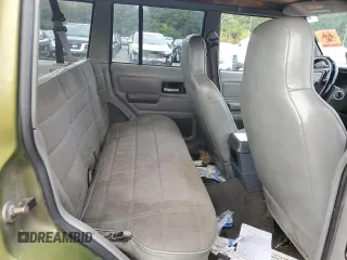 1996 Jeep Cherokee Sport with VIN 1J4FJ68S9TL291661, listed as a Copart auction lot 71968934 with 139,695 mi miles and Salvage Title. Bid and sale history available at carsss.com. Image 11.