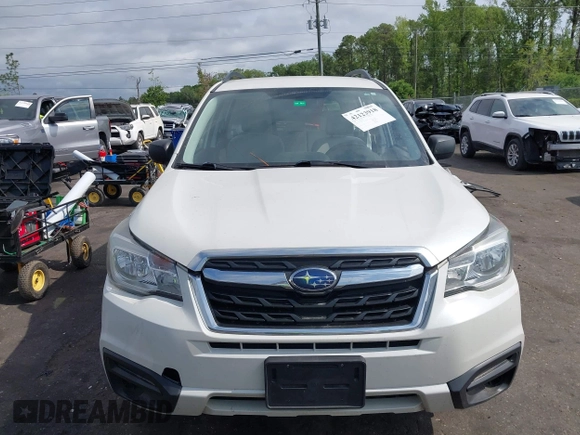 2018 Subaru Forester z VIN JF2SJABC5JH444739, wystawiony jako IAAI lot #42123918 z przebiegiem 124 520 mil mil oraz . Historia ofert i sprzedaży dostępna na DreamBid. Obrazek 13.