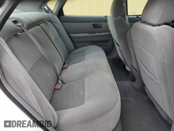 2006 Ford Taurus SE с VIN 1FAFP53U36A184540, выставлен на аукционе Copart как лот 57990175 с пробегом 144 768 миль миль и Списание • Salvage title. История ставок и продаж доступна на DreamBid. Изображение 10.