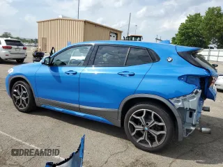 2018 BMW X2 xDrive28i z VIN WBXYJ5C32JEF72801, wystawiony jako Copart lot #56535445 z przebiegiem 45 497 mil mil oraz Szkody całkowita. Historia ofert i sprzedaży dostępna na DreamBid. Obrazek 2.