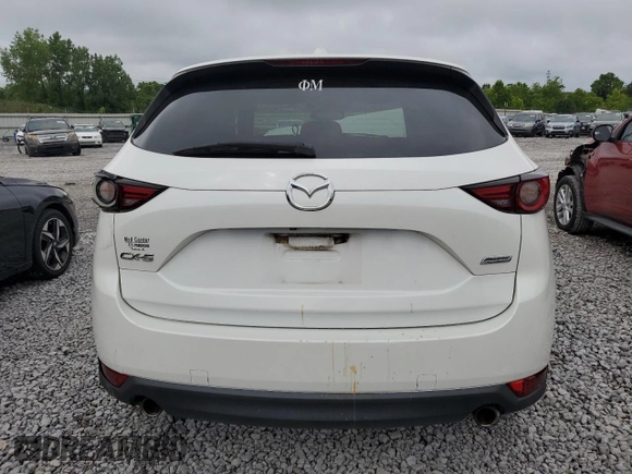 2019 Mazda CX-5 Grand Touring with VIN JM3KFADM6K1581261, listed as a Copart auction lot 59965175 with 127,837 mi miles and Salvage title. Bid and sale history available at DreamBid. Image 6.