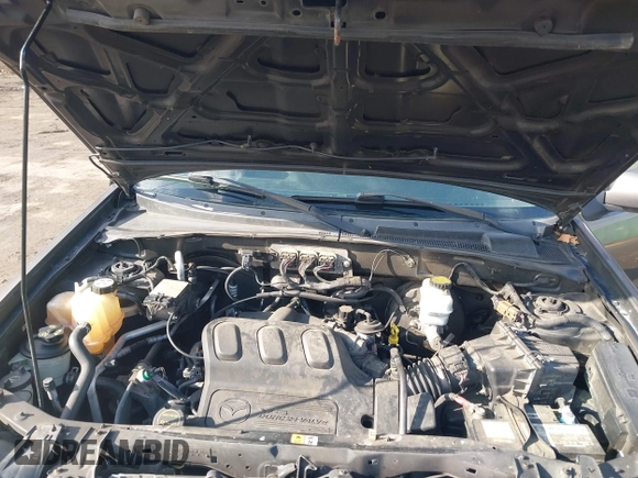 2006 Mazda Tribute LX with VIN 4F2YZ94126KM19822, listed as a IAAI auction lot 41534784 with 193,467 mi miles and . Bid and sale history available at DreamBid. Image 10.