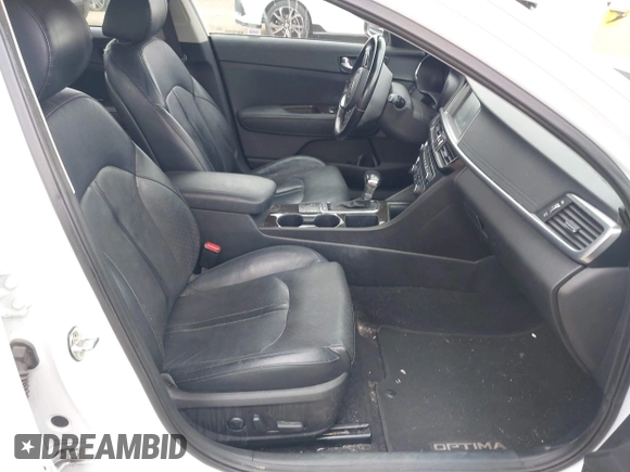 2016 Kia Optima EX with VIN 5XXGU4L31GG086203, listed as a IAAI auction lot 42128099 with 157,988 mi miles. Bid and sale history available at carsss.com. Image 5.