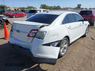 2016 Ford Taurus SEL with VIN 1FAHP2E84GG102031, listed as a IAAI auction lot 40597227 with 167,410 mi miles and . Bid and sale history available at DreamBid. Image 4.