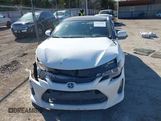 2014 Scion tC z VIN JTKJF5C74E3072410, wystawiony jako IAAI lot #41810965 z przebiegiem 147 164 mil mil oraz . Historia ofert i sprzedaży dostępna na DreamBid. Obrazek 13.