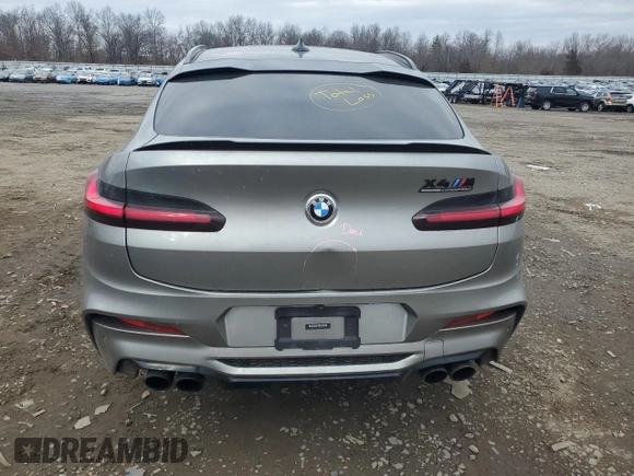 2021 BMW X4 M z VIN 5YMUJ0C03M9F20053, wystawiony jako Copart lot #87595845 z przebiegiem Nie podano mil oraz Szkody całkowita. Historia ofert i sprzedaży dostępna na DreamBid. Obrazek 6.