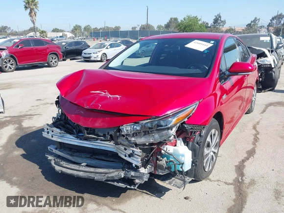 2020 Toyota Prius LE with VIN JTDKARFP8L3154280, listed as a IAAI auction lot 42405444 with 57,134 mi miles and . Bid and sale history available at DreamBid. Image 2.