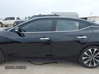 2016 Nissan Maxima SV z VIN 1N4AA6AP2GC376472, wystawiony jako IAAI lot #42115734 z przebiegiem 98 432 mil mil oraz . Historia ofert i sprzedaży dostępna na DreamBid. Obrazek 14.