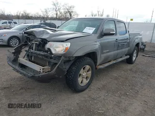 2014 Toyota Tacoma with VIN 3TMMU4FN7EM067182, listed as a IAAI auction lot 41108551 with 156,398 mi miles and . Bid and sale history available at DreamBid. Image 2.
