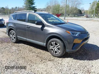 2016 Toyota RAV4 LE with VIN JTMZFREV5GJ078051, listed as a IAAI auction lot 41858381 with 97,032 mi miles and . Bid and sale history available at DreamBid. Image 1.