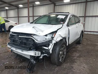 2019 Honda CR-V EX with VIN 2HKRW2H56KH641449, listed as a IAAI auction lot 41762860 with 181,557 mi miles and . Bid and sale history available at DreamBid. Image 6.