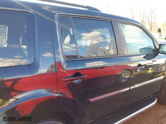 2015 Honda Pilot Touring with VIN 5FNYF4H94FB024890, listed as a IAAI auction lot 41658804 with 118,107 mi miles. Bid and sale history available at carsss.com. Image 14.