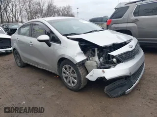 2015 Kia Rio LX with VIN KNADM4A39F6452036, listed as a IAAI auction lot 41516879 with 95,775 mi miles. Bid and sale history available at carsss.com. Image 1.