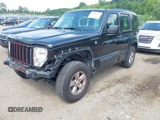 2012 Jeep Liberty Sport z VIN 1C4PJMAK1CW163938, wystawiony jako IAAI lot #42680723 z przebiegiem 138 238 mil mil oraz . Historia ofert i sprzedaży dostępna na DreamBid. Obrazek 2.