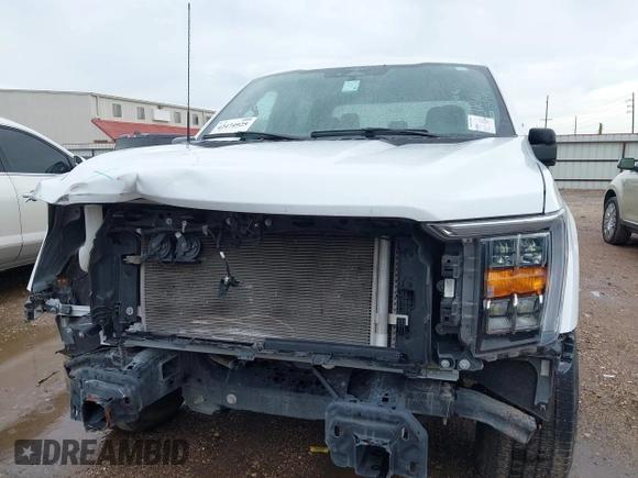 2023 Ford F-150 XL with VIN 1FTEW1C5XPFC56753, listed as a IAAI auction lot 42474925 with 37,614 mi miles and . Bid and sale history available at DreamBid. Image 13.