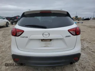 2016 Mazda CX-5 Touring with VIN JM3KE2CY9G0733933, listed as a Copart auction lot 45118885 with 149,901 mi miles and Salvage Title. Bid and sale history available at carsss.com. Image 6.