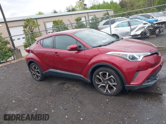 2019 Toyota C-HR XLE with VIN NMTKHMBX0KR088761, listed as a IAAI auction lot 42037328 with 28,501 mi miles and . Bid and sale history available at DreamBid. Image 13.