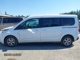 2014 Ford Transit Connect XLT z VIN NM0GS9F75E1141212, wystawiony jako IAAI lot #42691464 z przebiegiem 101 475 mil mil oraz . Historia ofert i sprzedaży dostępna na DreamBid. Obrazek 15.