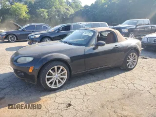 2006 Mazda MX-5 Miata Touring with VIN JM1NC25F660107925, listed as a Copart auction lot 64079215 with 133,522 mi miles and Clean title. Bid and sale history available at DreamBid. Image 1.