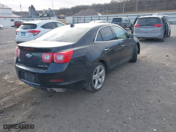 2014 Chevrolet Malibu LTZ with VIN 1G11J5SX4EF173347, listed as a IAAI auction lot 41345183 with 119,080 mi miles. Bid and sale history available at carsss.com. Image 4.