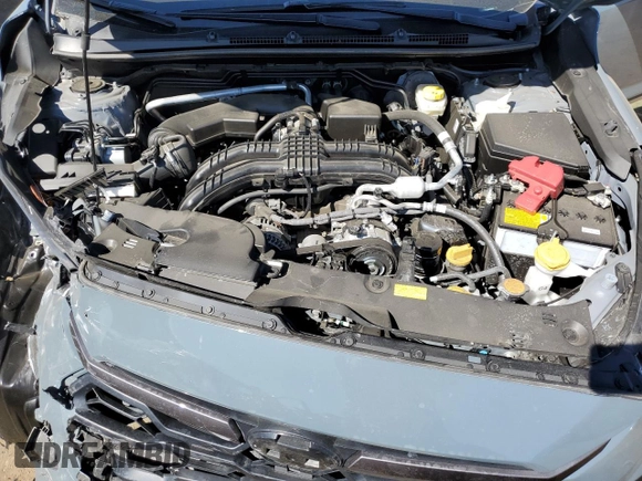 2024 Subaru Crosstrek Premium z VIN JF2GUADC9R8305042, wystawiony jako Copart lot #55796805 z przebiegiem 9 518 mil mil oraz Szkoda całkowita • Salvage title. Historia ofert i sprzedaży dostępna na DreamBid. Obrazek 12.