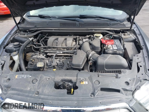 2013 Ford Taurus SEL with VIN 1FAHP2E82DG230831, listed as a IAAI auction lot 42078978 with 207,075 mi miles and . Bid and sale history available at carsss.com. Image 10.
