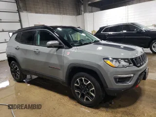 2020 Jeep Compass Trailhawk with VIN 3C4NJDDB0LT215553, listed as a Copart auction lot 45045165 with 90,702 mi miles and Salvage Title. Bid and sale history available at carsss.com. Image 4.