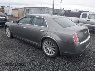2011 Chrysler 300 with VIN 2C3CA6CT8BH547555, listed as a IAAI auction lot 41858626 with 141,853 mi miles. Bid and sale history available at carsss.com. Image 3.