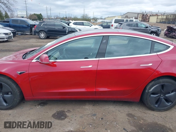 2018 Tesla Model 3 Long Range Battery with VIN 5YJ3E1EB3JF129772, listed as a IAAI auction lot 42017305 with 103,825 mi miles and . Bid and sale history available at DreamBid. Image 13.