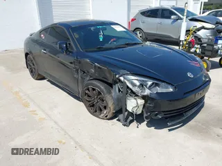 2008 Hyundai Tiburon GT z VIN KMHHN66F18U278666, wystawiony jako IAAI lot #42023476 z przebiegiem 135 588 mil mil oraz . Historia ofert i sprzedaży dostępna na DreamBid. Obrazek 1.
