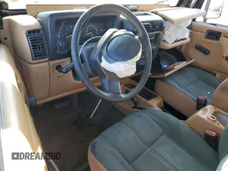 1997 Jeep Wrangler Sahara with VIN 1J4FY49S2VP542031, listed as a Copart auction lot 42509765 with 136,689 mi miles and Salvage Title. Bid and sale history available at carsss.com. Image 8.