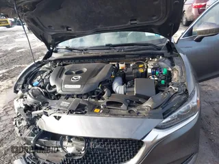 2020 Mazda 6 Grand Touring with VIN JM1GL1TY0L1521859, listed as a IAAI auction lot 41634368 with 36,709 mi miles and . Bid and sale history available at DreamBid. Image 10.