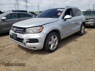 2012 Volkswagen Touareg Exec with VIN WVGEF9BP9CD009937, listed as a Copart auction lot 59622944 with Not Provided miles and Clean Title. Bid and sale history available at DreamBid. Image 1.