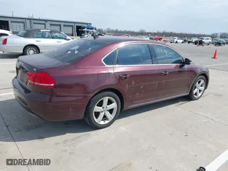 2012 Volkswagen Passat SE w/Sunroof with VIN 1VWBH7A31CC076037, listed as a IAAI auction lot 41905200 with 141,809 mi miles. Bid and sale history available at carsss.com. Image 4.