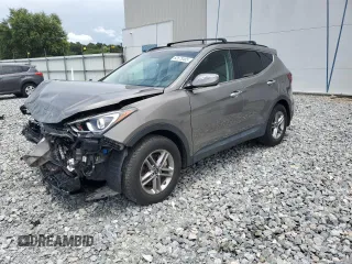 2018 Hyundai Santa Fe 2.4L with VIN 5NMZU3LB2JH054069, listed as a Copart auction lot 62673485 with 66,204 mi miles and Salvage title. Bid and sale history available at DreamBid. Image 1.