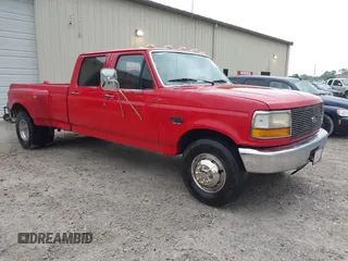 1996 Ford F-350 with VIN 1FTJW35F6TEA21282, listed as a IAAI auction lot 42178727 with 199,776 mi miles and . Bid and sale history available at DreamBid. Image 1.