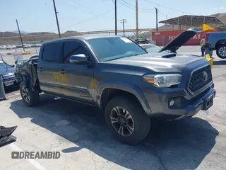 2018 Toyota Tacoma SR5 with VIN 3TMBZ5DNXJM012883, listed as a IAAI auction lot 42510217 with 167,700 mi miles and . Bid and sale history available at DreamBid. Image 1.