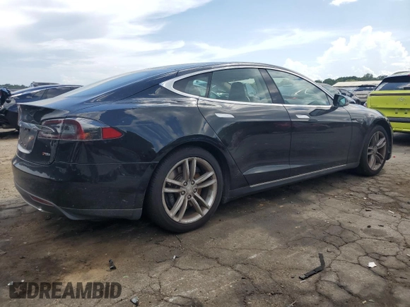 2013 Tesla Model S with VIN 5YJSA1CN8DFP06126, listed as a Copart auction lot 63098515 with 47,215 mi miles and Clean title. Bid and sale history available at DreamBid. Image 3.