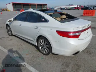 2014 Hyundai Azera Limited with VIN KMHFH4JG8EA390171, listed as a IAAI auction lot 41844326 with 159,884 mi miles and . Bid and sale history available at carsss.com. Image 3.